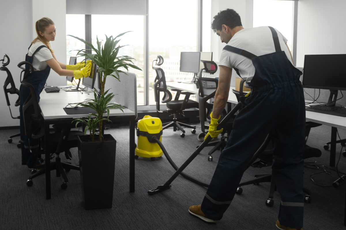 employee of spot cleaners are commercially cleaning
